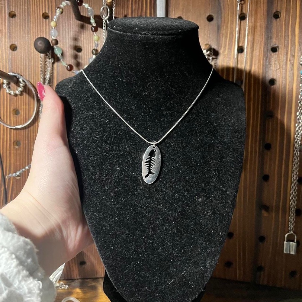handmade y2k snake cord silver necklace with hallow oval fish skeleton pendant